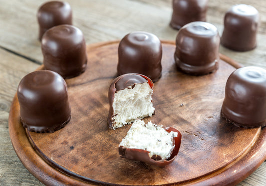 Indulgence in Every Bite: Chocolate-Covered Cheesecake Bites - Hill Country Chocolate